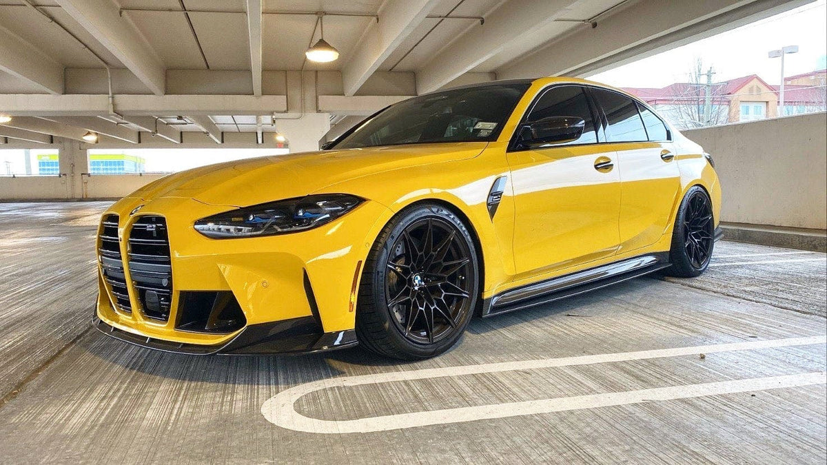 BMW M4 G82 G83 carbon fiber side skirt extensions by CT Carbon, showcasing sleek, lightweight aerodynamic design on the vehicle.