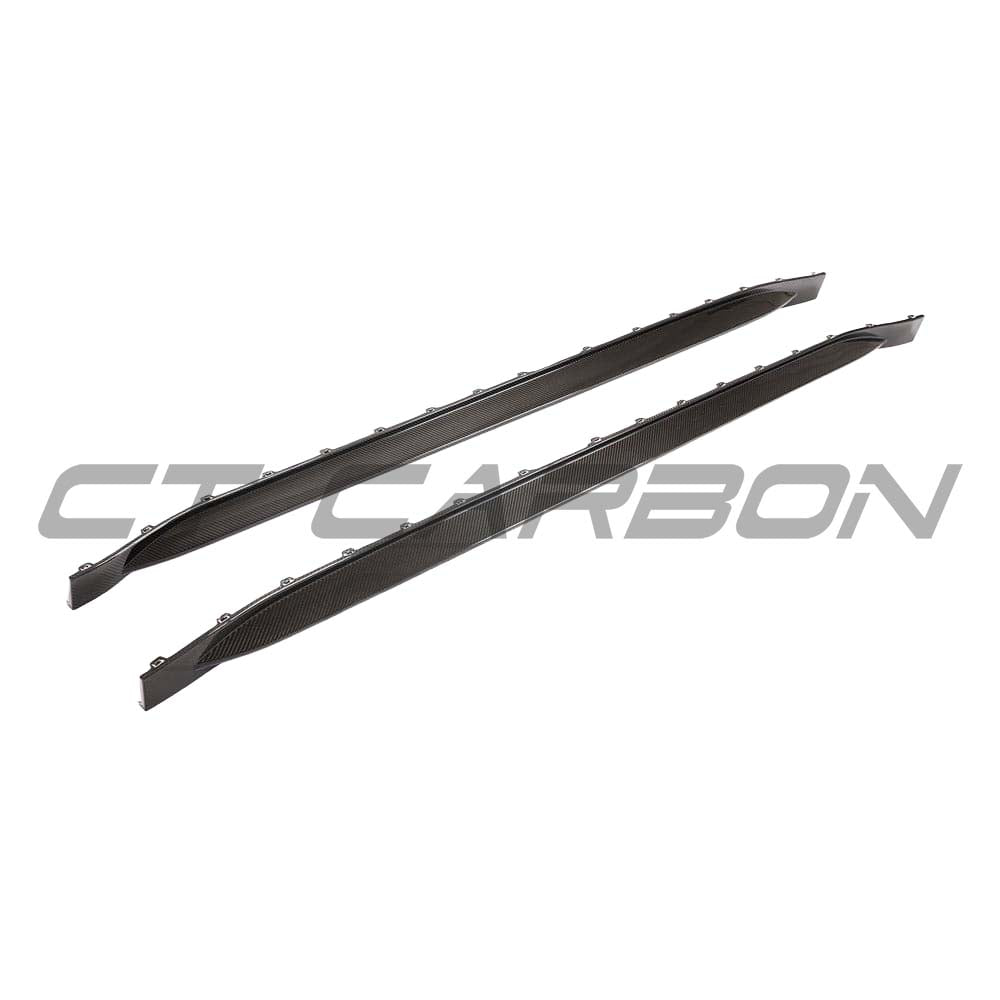 BMW G82 M4 full carbon fiber kit by CT Design, featuring side skirt replacements with sleek, high-quality carbon fiber finish.