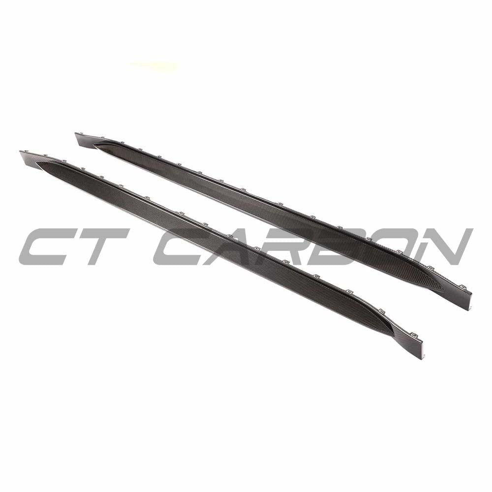 BMW G83 M4 full carbon fibre kit by CT Design, featuring side skirts and aerodynamic enhancements on a sleek car.