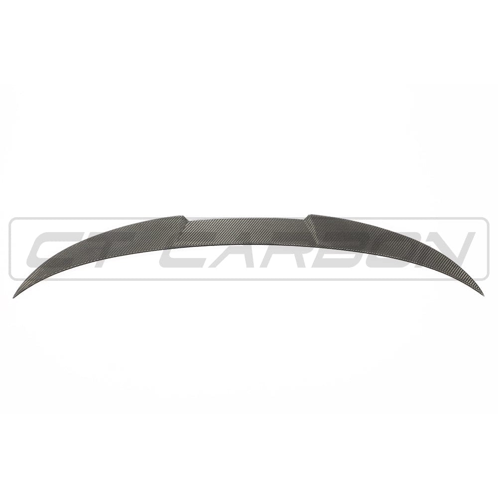 BMW M4 G83 carbon fibre kit by CT Design, featuring sleek carbon fiber components on a sporty vehicle.