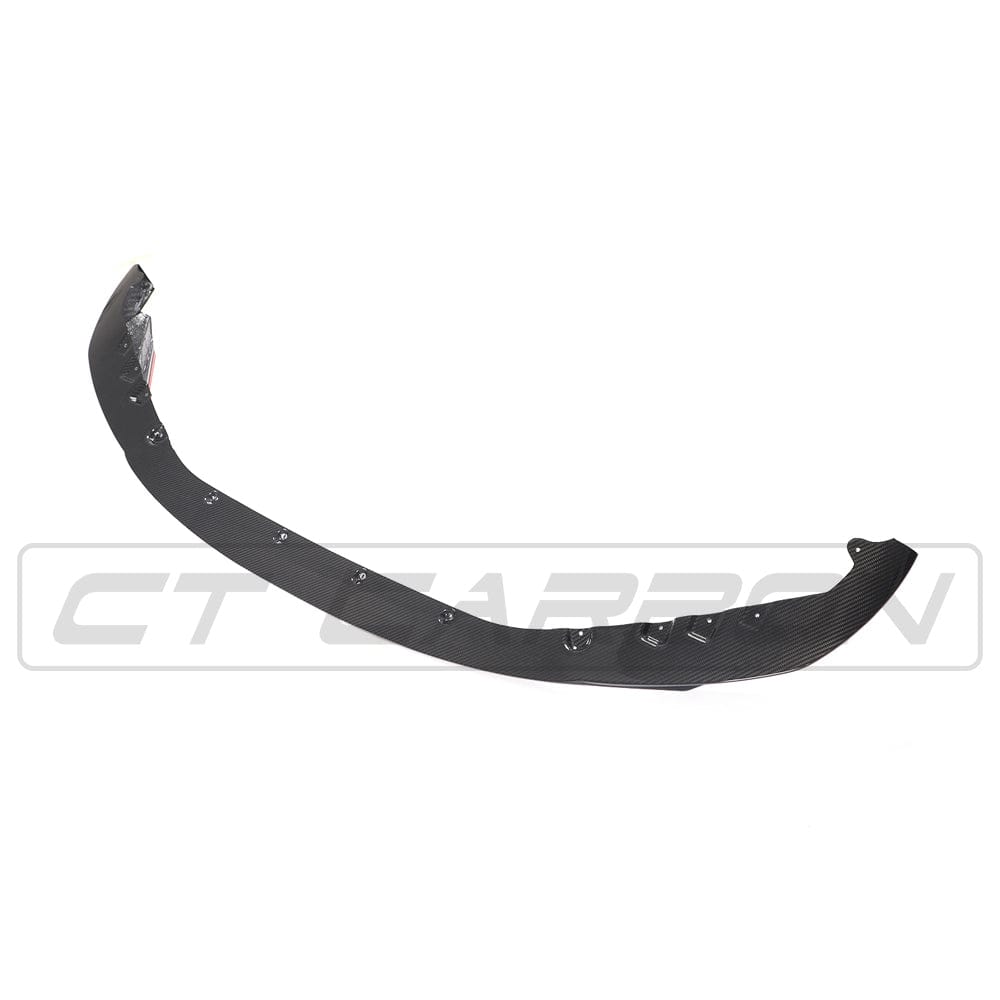 BMW M4 G83 carbon fibre kit from CT Design, showing detailed close-up of carbon fibre components on the car.