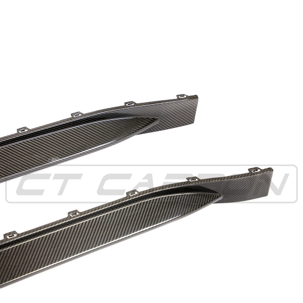 BMW M4 G83 carbon fibre kit by CT Carbon, featuring sleek, lightweight automotive parts with a glossy finish and detailed craftsmanship.