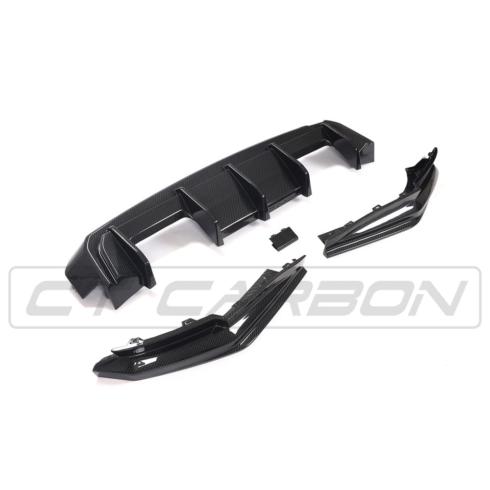 BMW M4 G83 full carbon fibre kit by CT Carbon, showing sleek carbon fibre components on the sporty vehicle.