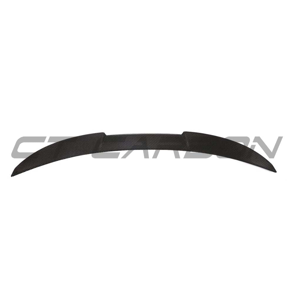 BMW G82 M4 full carbon fibre kit by CT Carbon, featuring a sleek carbon fibre spoiler on a sporty BMW G82 M4 car.