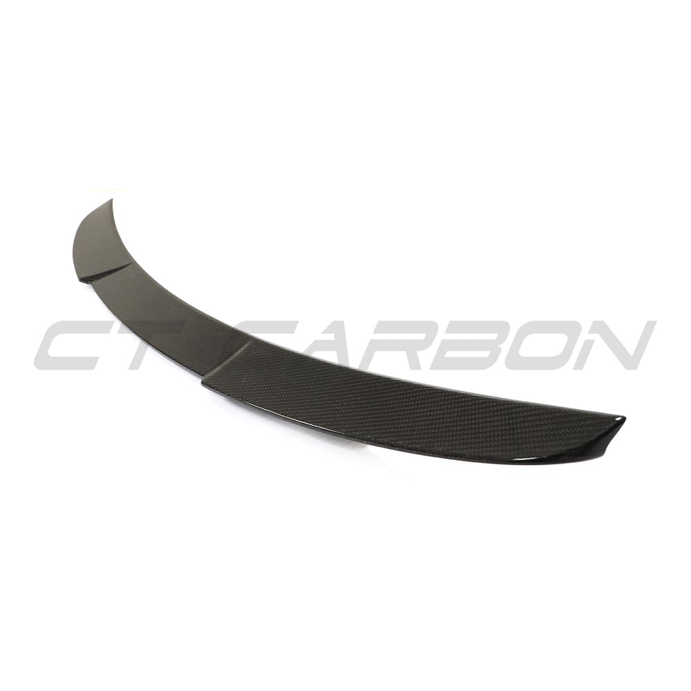 BMW M4 G82 G22 carbon fiber spoiler by CT Carbon, showcasing a sleek, aerodynamic M4-style spoiler on a sporty car.