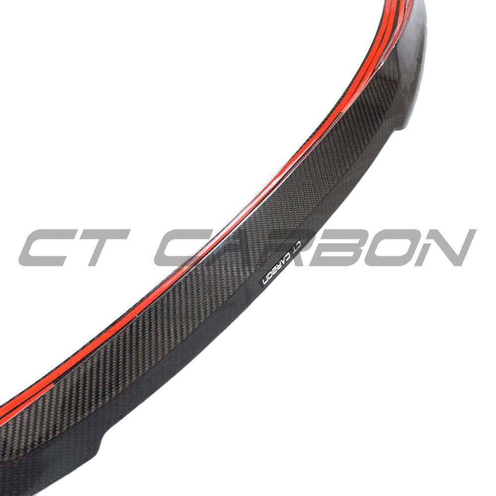 BMW M4 G82 G22 carbon fibre spoiler by CT Carbon, V3 style, showing sleek aerodynamic design on the car's rear.