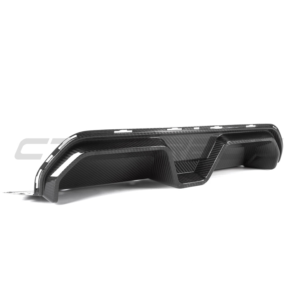BMW M5 F90 2018-2024 CT Carbon pre-preg carbon fiber diffuser with CS style design, showcasing sleek aerodynamic detailing.