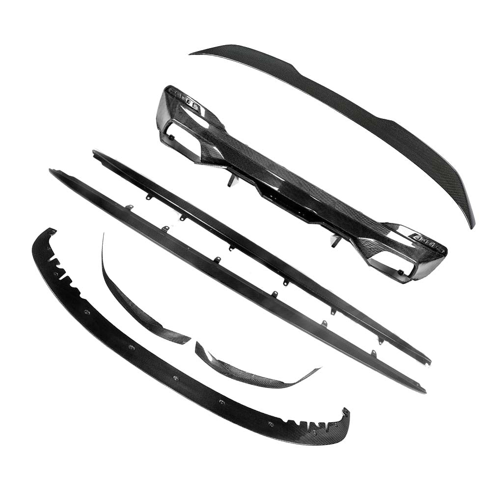 BMW G30 5 Series carbon fibre kit by CT Carbon, featuring V8 engine style ducktail spoiler on a black car.