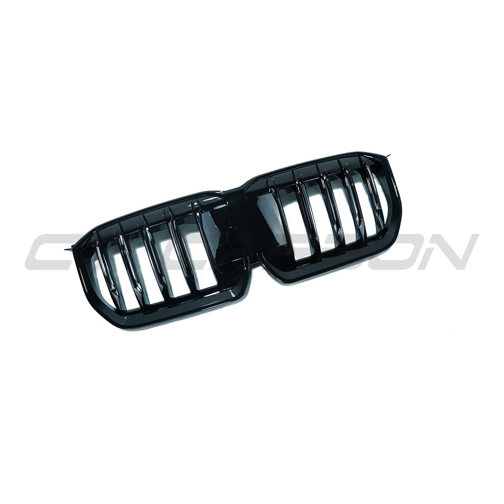 BMW U11 X1 2023 CT Carbon gloss black single slat grille showing the sleek, shiny front grille design with a single horizontal slat.