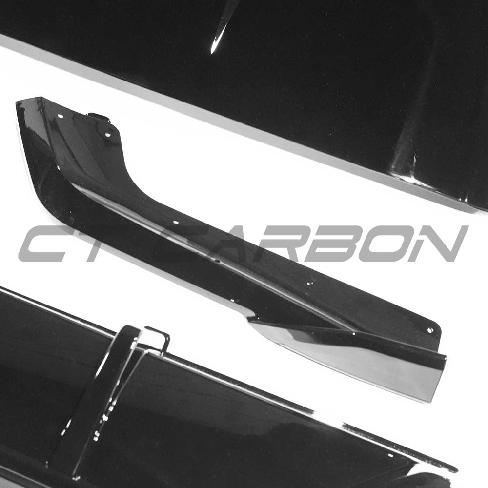 Full gloss black kit for BMW F15 X5 2014-2018 by CT Carbon, including various parts installed on the vehicle.