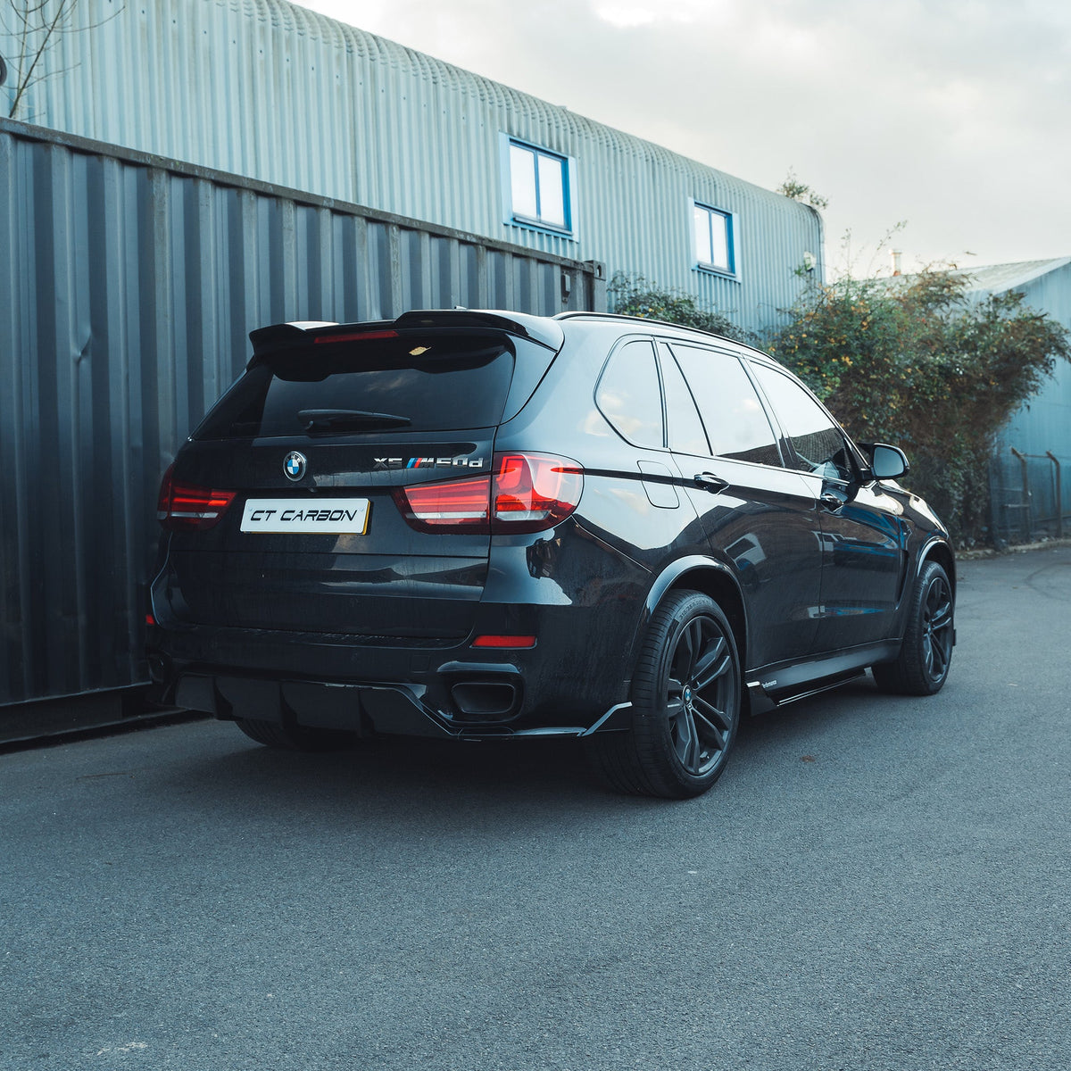 BMW F15 X5 2014-2018 full gloss black kit by CT Carbon, showing detailed view of the complete exterior upgrade components.