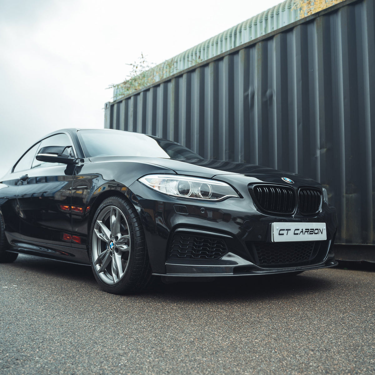 BMW F22 2 Series full carbon fiber kit by CT Carbon, showing detailed carbon fiber panels on the vehicle.
