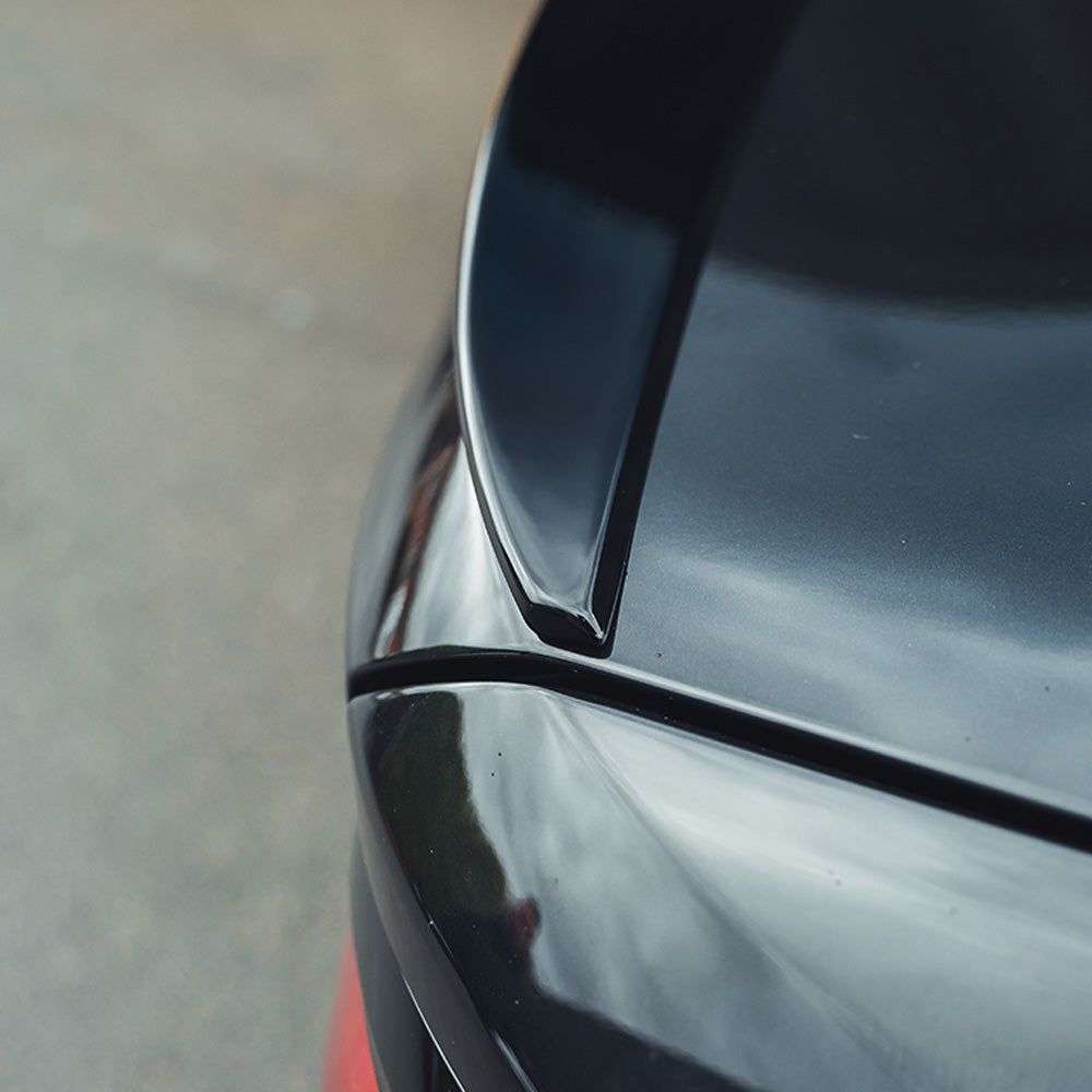 BMW 5 Series G30 CT Carbon V5 gloss black spoiler installed on the rear of the car, enhancing aerodynamics and sporty appearance.