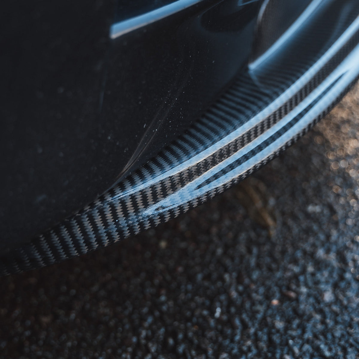 BMW M3 E92/E90 carbon fiber splitter by CT Carbon, V1, showcasing the aerodynamic front splitter for the 2007-2013 model.