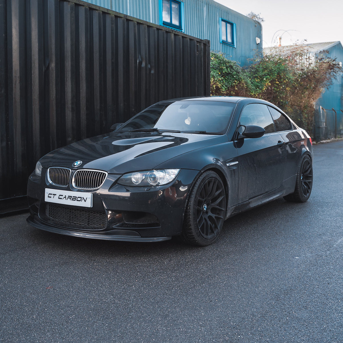 BMW M3 E92/E90 carbon fiber splitter V1 by CT Carbon, showcasing the sleek aerodynamic design of the splitte