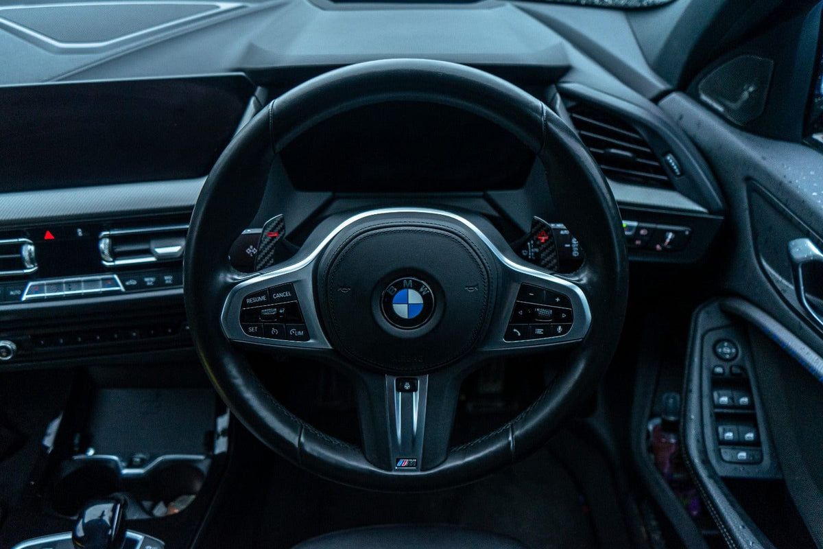 BMW and MINI Fxx Gxx carbon fiber shifter paddles by CT Carbon, showcasing sleek, lightweight racing-style gear shift accessories.