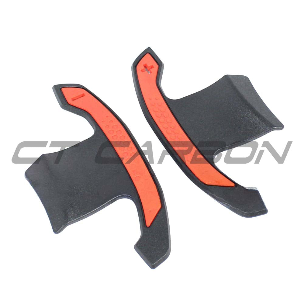 BMW and MINI Fxx Gxx carbon fibre shifter paddles by CT Carbon, showing sleek, lightweight carbon fibre finish and ergonomic design.