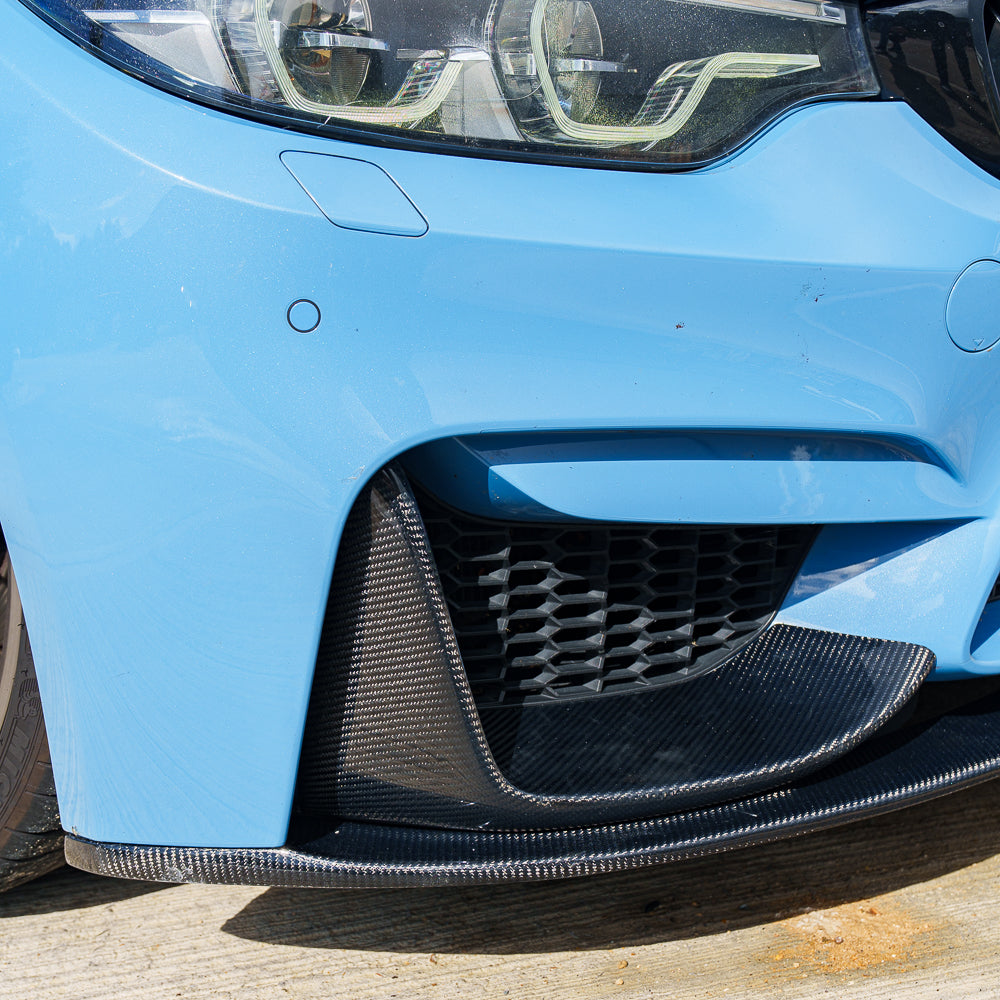 Blue BMW M3 F80 with CT Carbon full carbon fibre kit, showcasing aerodynamic upgrades on the car's exterior.