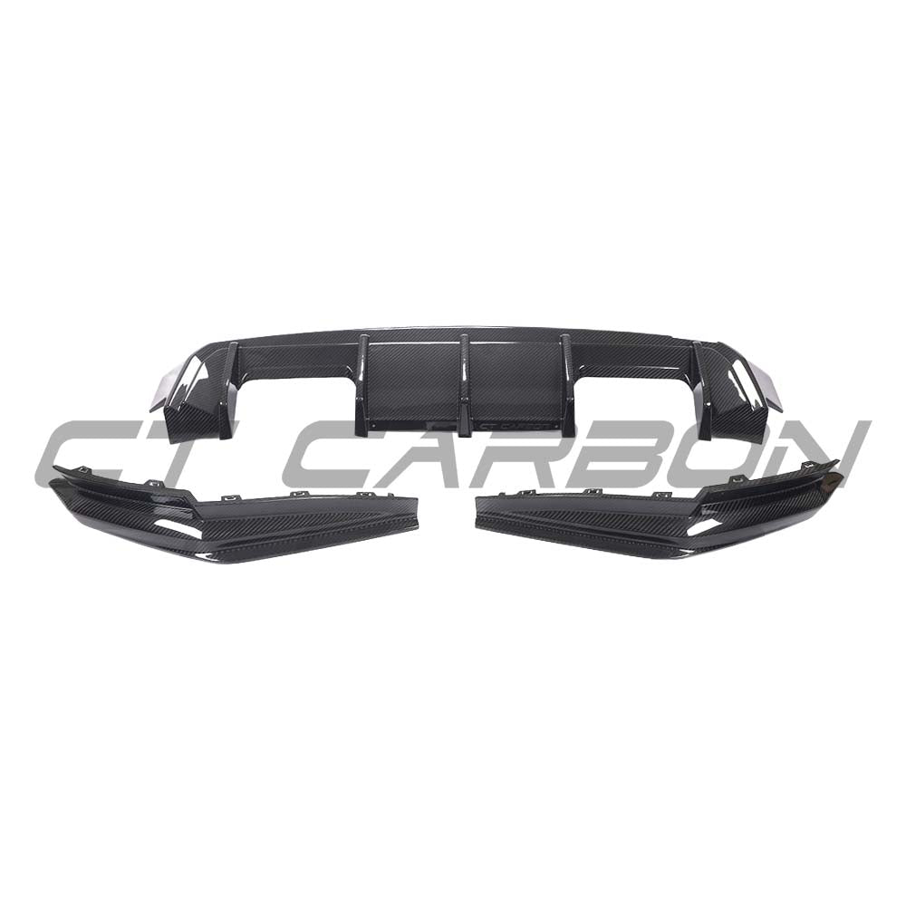 BMW G80 M3 full carbon fiber kit from CT Carbon, featuring diffuser and aerodynamic components on a sleek sports car.