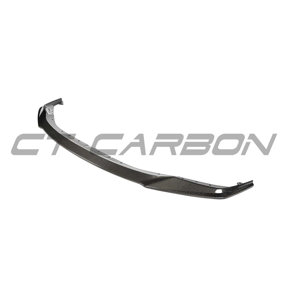 BMW G80 M3 full carbon fiber kit by CT Carbon, including splitter and aerodynamic components, featuring V12 branding.