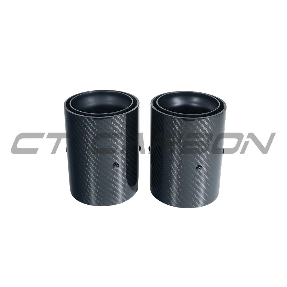 Set of two BMW F20-F33 CT Carbon matte black exhaust tips, designed to enhance the vehicle's sporty appearance.