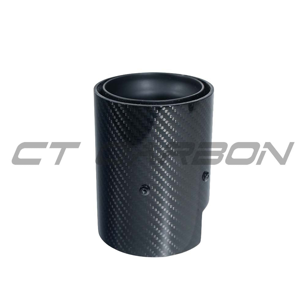 Set of two matte black BMW F20 to F33 CT Carbon exhaust tips, enhance car’s rear with stylish carbon fiber design.