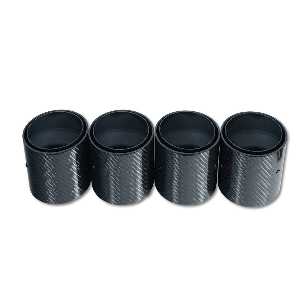 Set of four black carbon exhaust tips for BMW M2, M3, M4 G87/G80/G81/G82/G83 by CT Carbon, slash cut design.