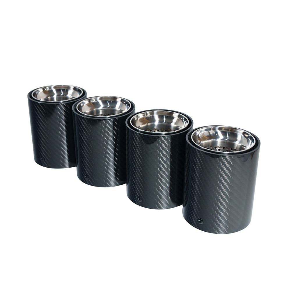 Set of four BMW F90/F92 M5/M8 carbon fiber exhaust tips with chrome finish by CT Carbon, showcasing sleek, polished design.