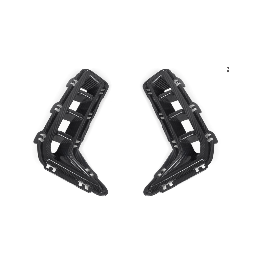 Carbon fiber front bumper corners for BMW G05 X5 LCI 2023+ by CT Carbon, showing sleek, aerodynamic design and high-quality material.