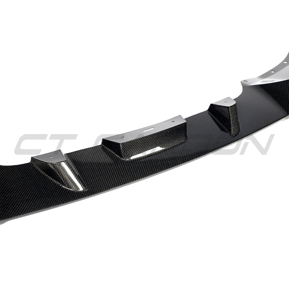 BMW G05 X5 LCI 2023+ CT Carbon V2 carbon fibre splitter installed on front bumper for enhanced aerodynamics and sporty look.