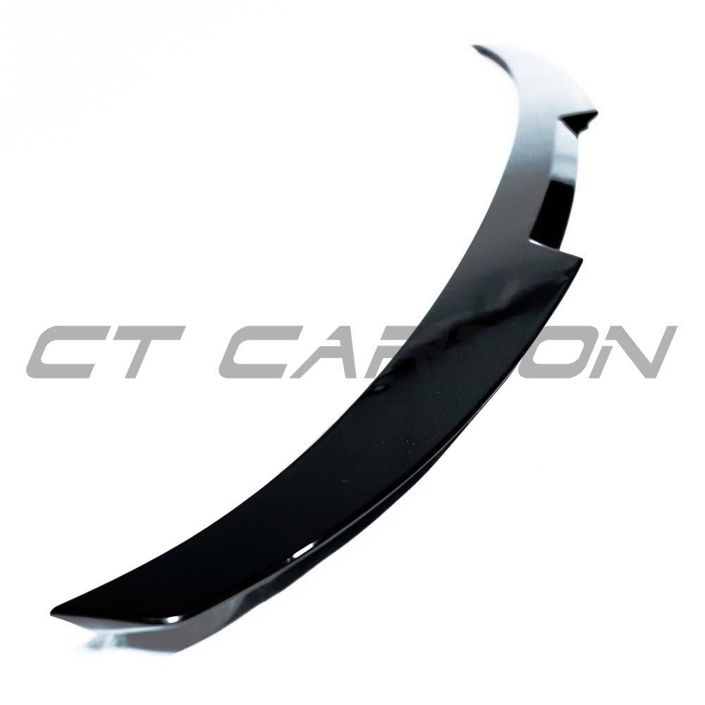 BMW 4 Series F32 CT Carbon gloss black spoiler mounted on vehicle, showcasing sleek aerodynamic design and high-quality finish.