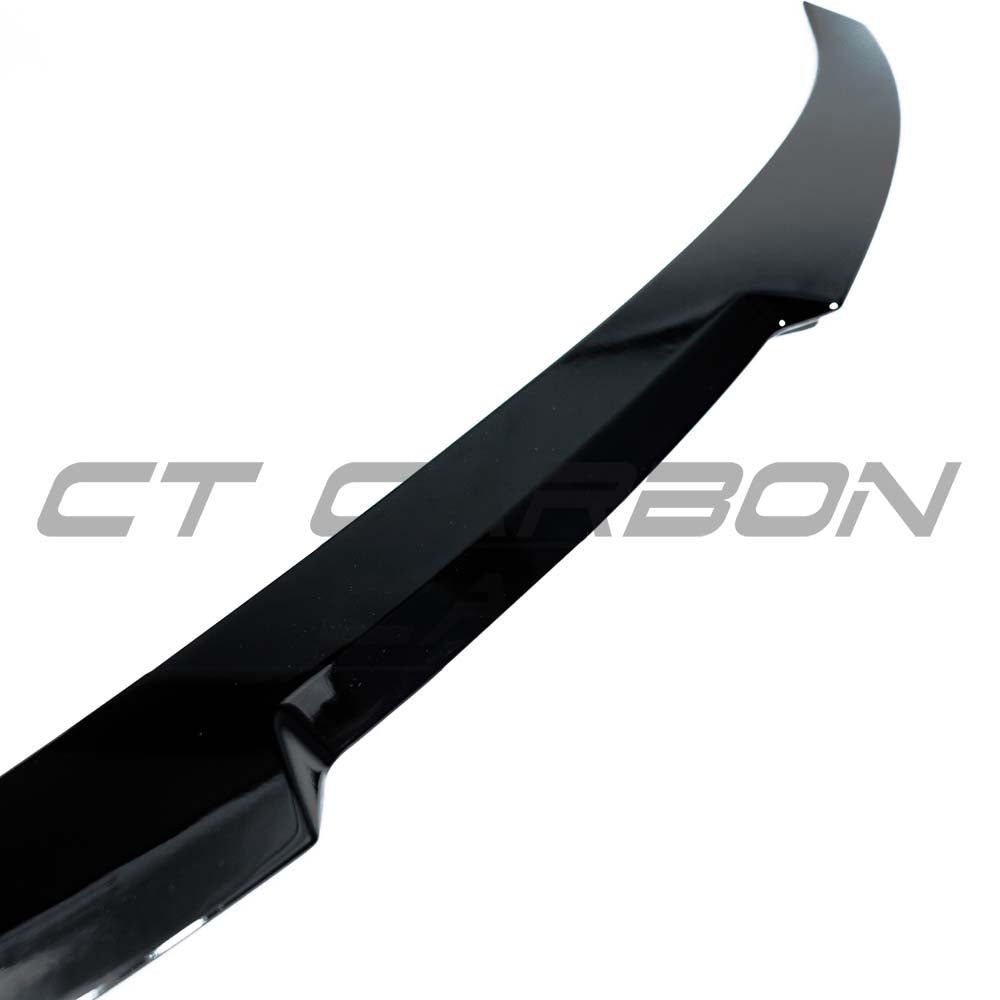 BMW 4 Series F32 gloss black spoiler by CT Carbon, showcasing sleek aerodynamic design and high-quality carbon fiber finish.