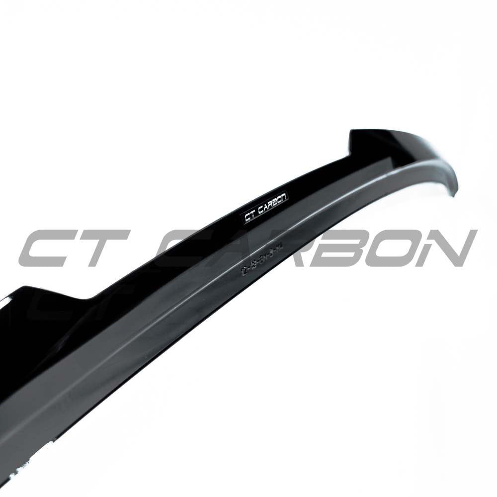 BMW 4 Series F32 Gloss Black Spoiler by CT Carbon, showcasing sleek aerodynamic design and glossy finish.