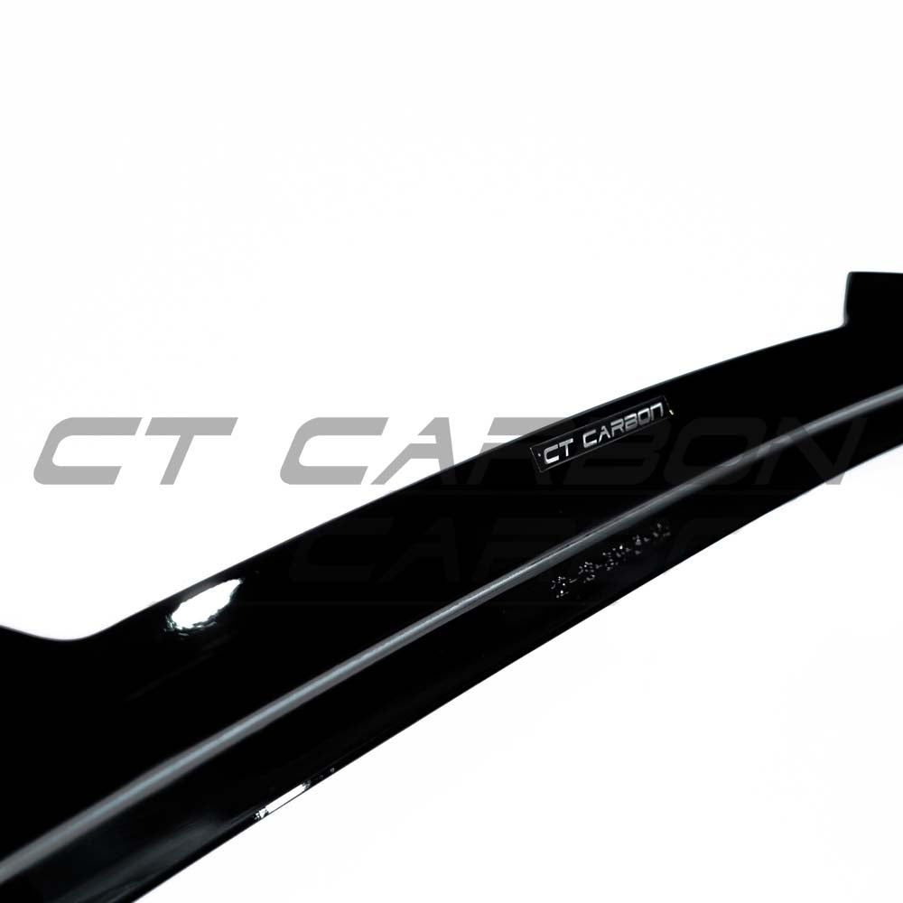 BMW 4 Series F32 gloss black spoiler by CT Carbon, showcasing the sleek aerodynamic design and glossy finish.