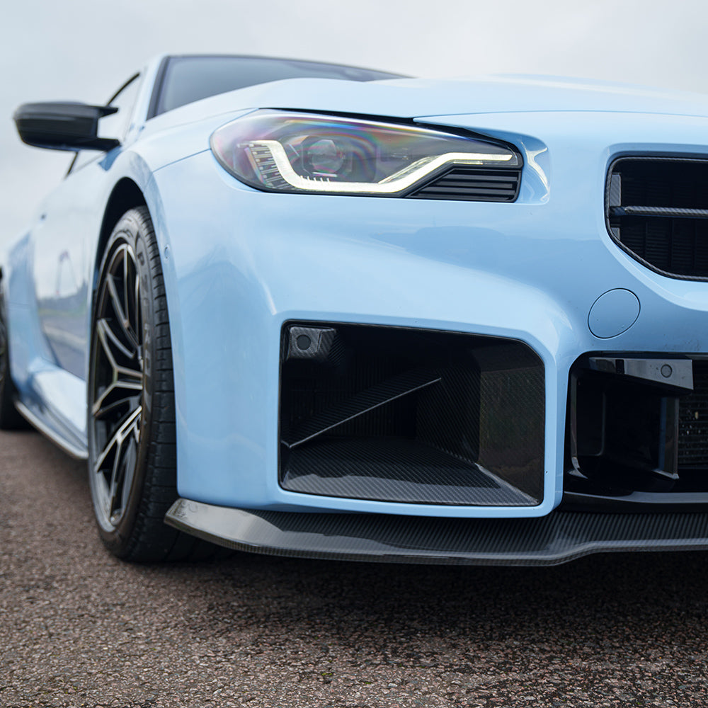 BMW G87 M2 2023 carbon fibre splitter by CT Carbon, V5 version, showcasing sleek aerodynamic design and lightweight construction.