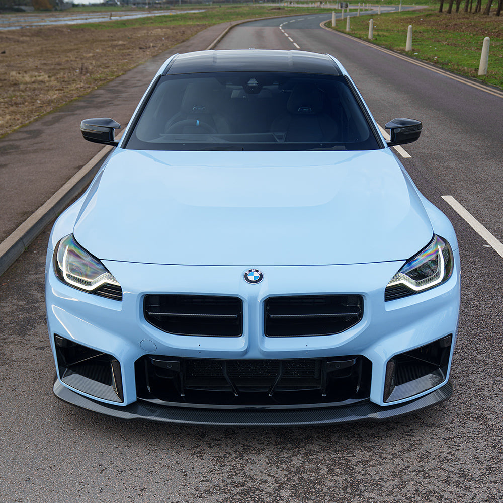 BMW G87 M2 2023 carbon fibre splitter by CT Carbon, V5 version, showcasing sleek, lightweight aerodynamic design.