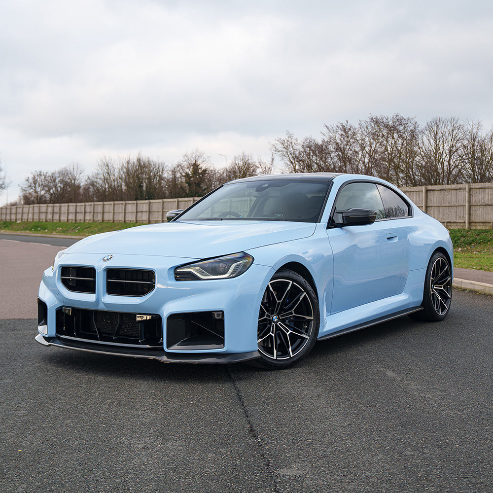 BMW G87 M2 2023 carbon fibre splitter by CT Design, V5 version, showcasing sleek, lightweight aerodynamic car accessory.