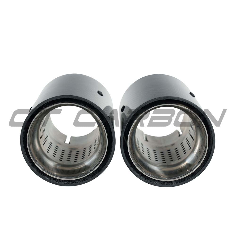 Set of two chrome BMW F20-F33 carbon exhaust tips by CT Carbon, featuring sleek black carbon fiber design.