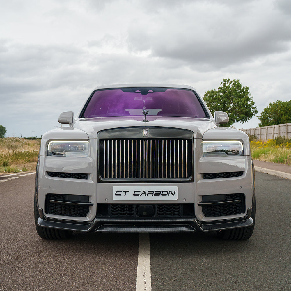 Carbon fiber splitter for Rolls Royce Cullinan by CT Carbon, featuring sleek, aerodynamic design and high-quality craftsmanship.