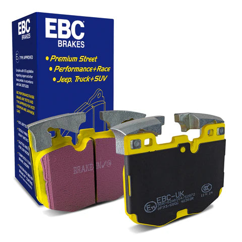 Pair of EBC Front Yellowstuff Brake Pads DP42302R for BMW M340i G20 G21, showing the yellow brake pad material and packaging.