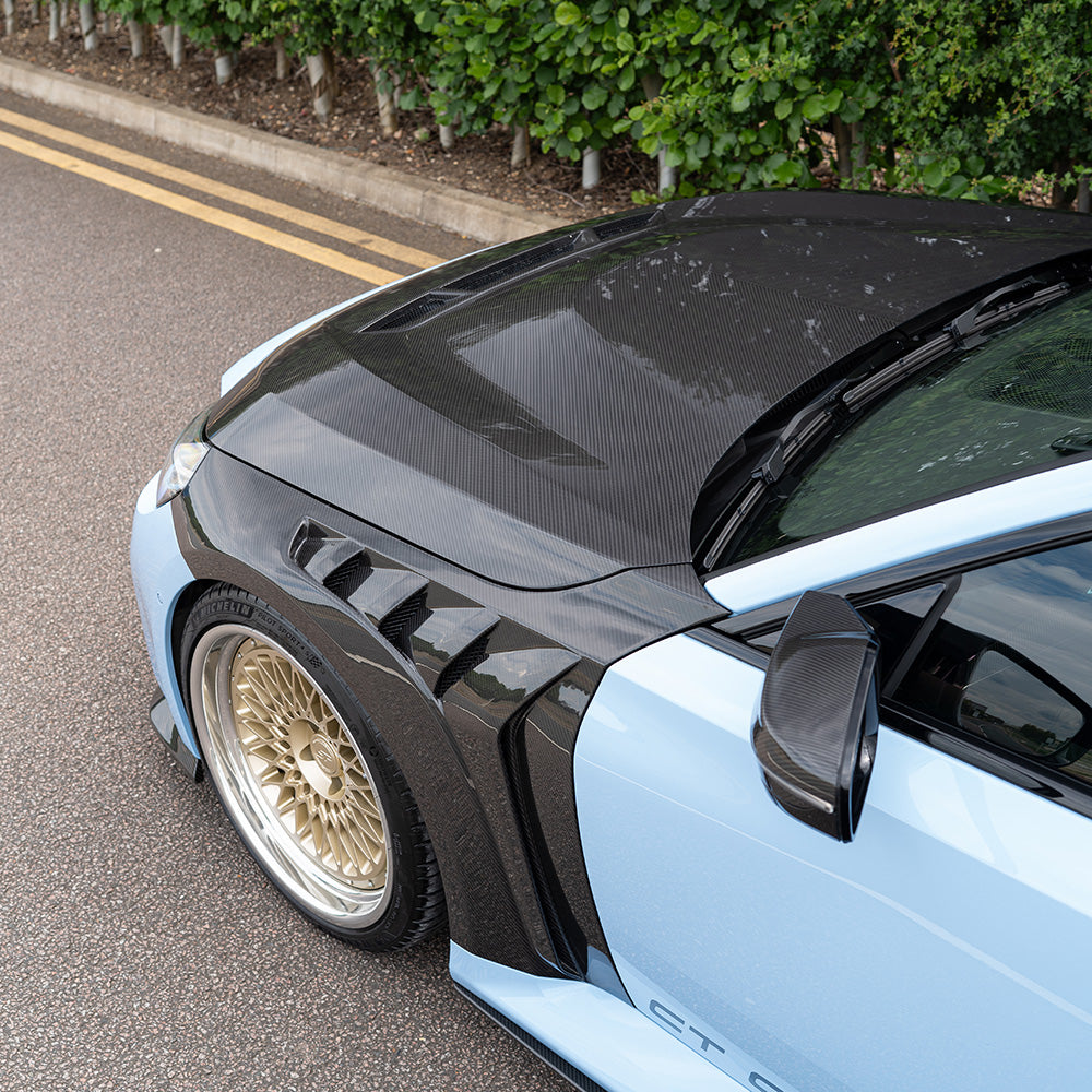 BMW G87 M2 CT Design full carbon fibre kit, showing lightweight, high-performance car exterior components on a sleek vehicle.