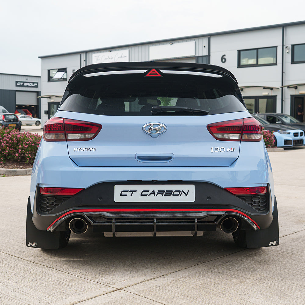 CT Carbon Hyundai i30N carbon fibre diffuser for facelift model, featuring sleek aerodynamic design and high-quality finish.