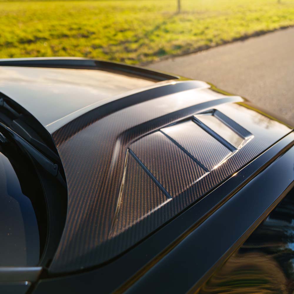 AUDI RS6 C8 2019+ full carbon fiber front end kit by CT Carbon, showcasing the sleek, lightweight carbon fiber components.