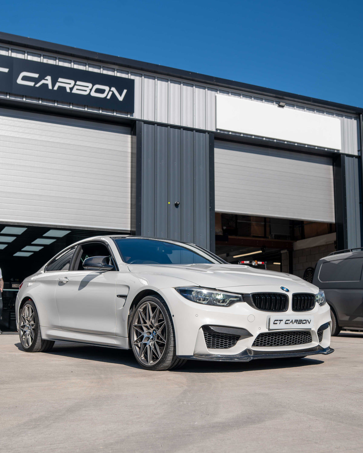 BMW F82 M4 coupe 2014-2020 CT Carbon V3 full carbon fibre kit, showing the sleek, lightweight carbon fiber components on the car.