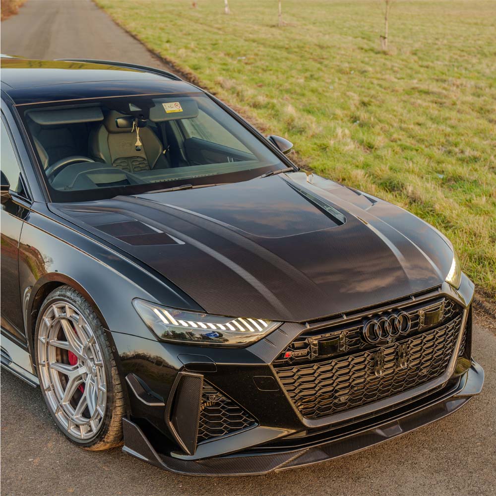 Full view of CT Carbon's Audi RS6 C8 2019+ carbon fiber kit, showcasing the sleek, textured carbon fiber components on the car.