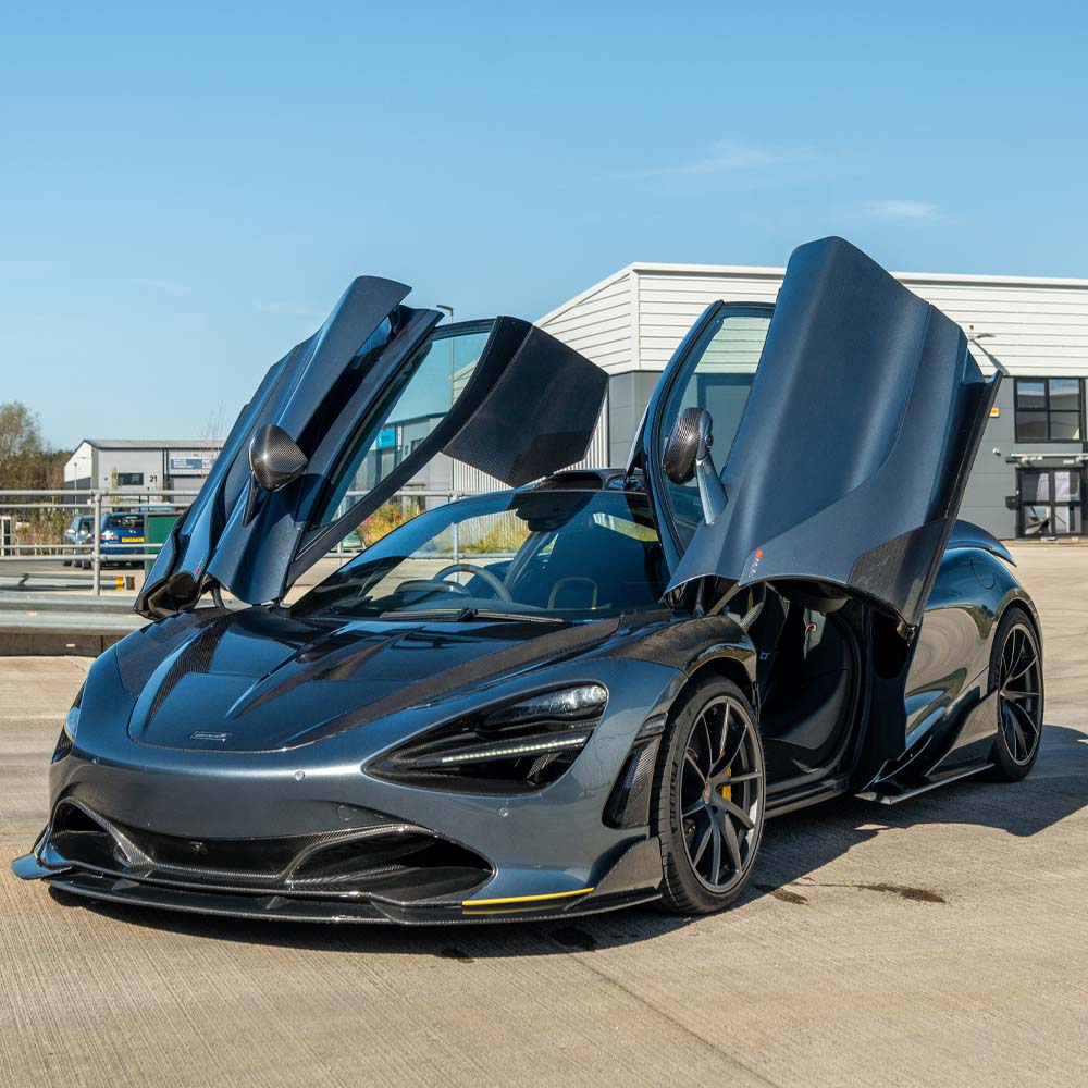 CT Carbon MCLAREN 720S Ultimate Kit installed on a car, showcasing detailed carbon fiber accents and aerodynamic enhancements.