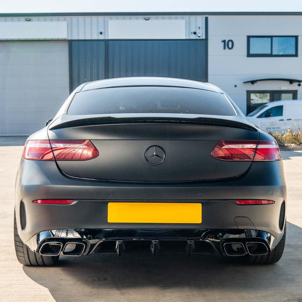 CT Carbon Mercedes C238 2017-2020 E-Class Coupe quad tip diffuser, showcasing sleek black carbon fiber finish and precise fitment.