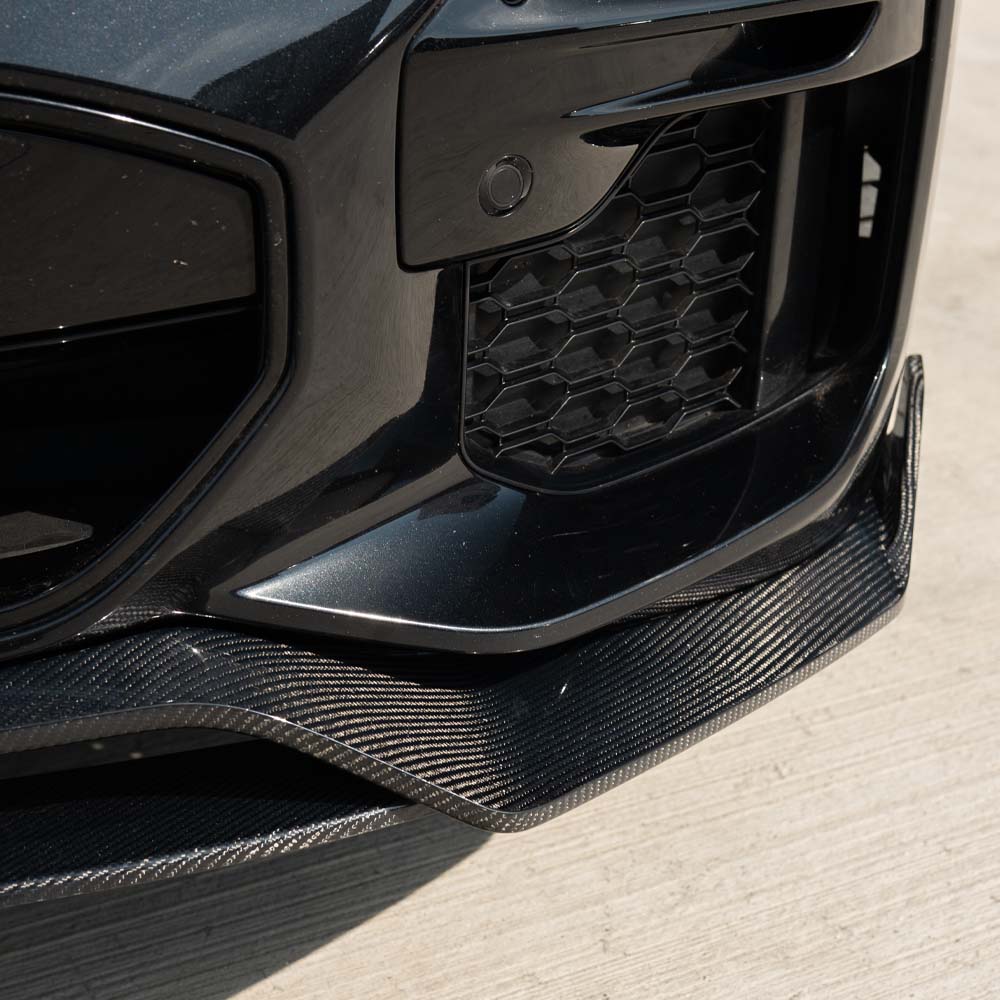 BMW G05 X5 CT Carbon full carbon fiber kit installed on the vehicle, showcasing sleek, high-quality carbon fiber panels and accents.