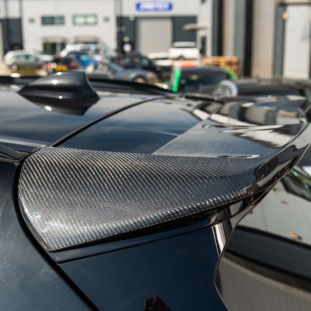 BMW G05 X5 CT Carbon full carbon fibre kit, V1, showing sleek carbon fibre panels and components on the vehicle.