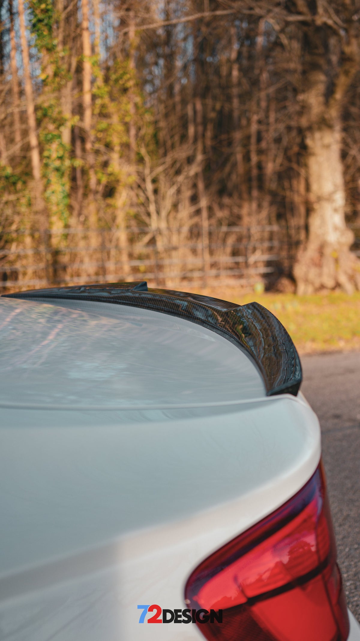 BMW 2 Series F22 gloss carbon fibre performance style spoiler by 72Design, shown on the vehicle’s rear trunk lid.